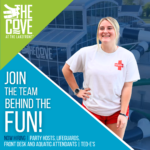 A person in a lifeguard uniform smiles in front of a water park building. The building has "The Cove" logo. The image features text: "Join the team behind the fun! Now hiring!