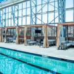An image of the cabanas by the pool all in a row